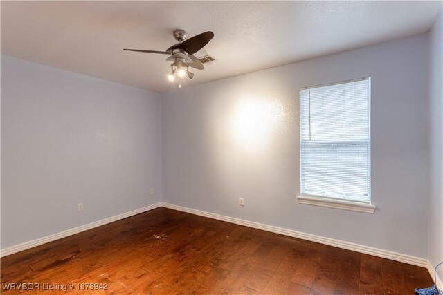 8901 16th St, Fort Smith, AR 72908 - unfurnished room with dark hardwood / wood-style floors and ceiling fan