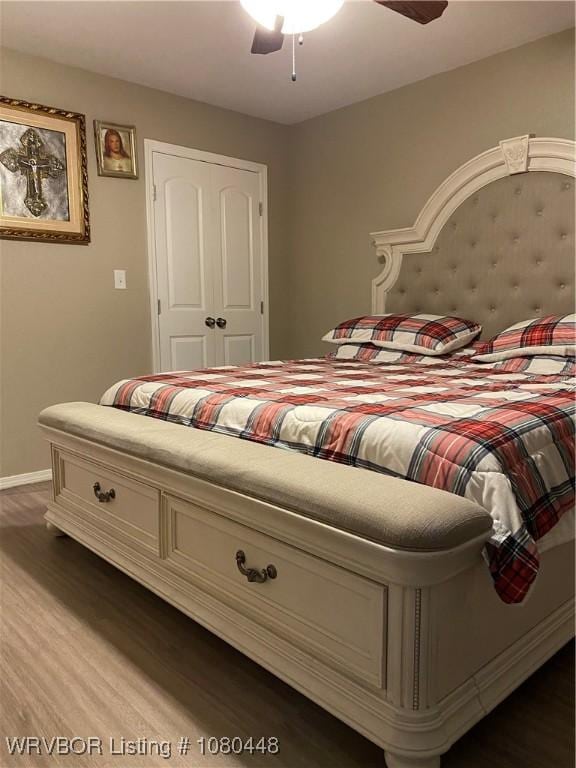 1111 Bluebird Dr, Cedarville, AR 72932 - bedroom featuring dark wood finished floors, baseboards, and ceiling fan