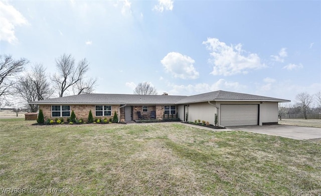 ranch-style home featuring a garage, a front lawn, and driveway