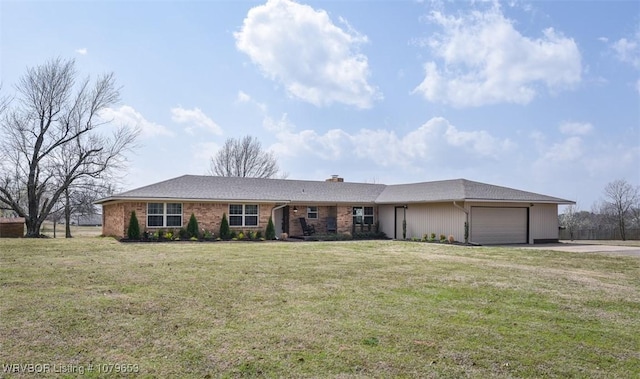 single story home featuring concrete driveway, a front yard, an attached garage, brick siding, and a chimney