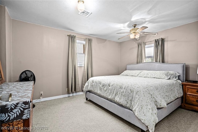 8437 Sebastian Lake Dr, Hackett, AR 72937 - carpeted bedroom with visible vents, a ceiling fan, and baseboards