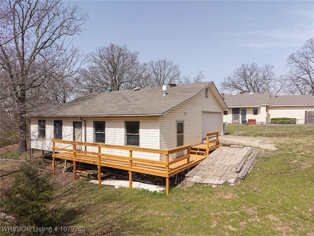 8437 Sebastian Lake Dr, Hackett, AR 72937 - rear view of house with fence, a yard, and a deck