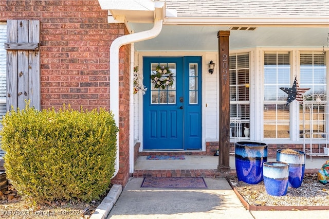 2027 High Meadow Ln, Alma, AR 72921 - doorway to property with brick siding and a shingled roof