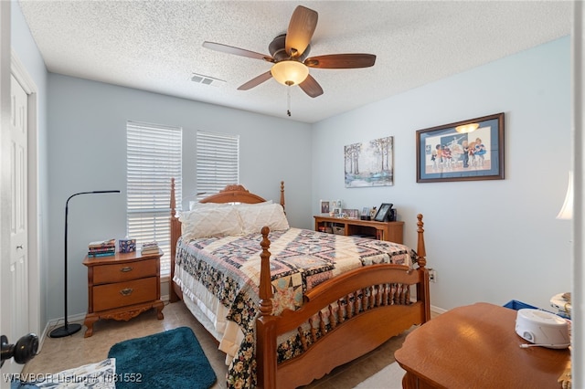 2027 High Meadow Ln, Alma, AR 72921 - bedroom with a closet, a textured ceiling, a ceiling fan, and baseboards