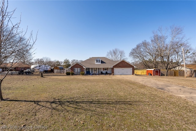 2027 High Meadow Ln, Alma, AR 72921 - view of front facade with asphalt driveway and a garage