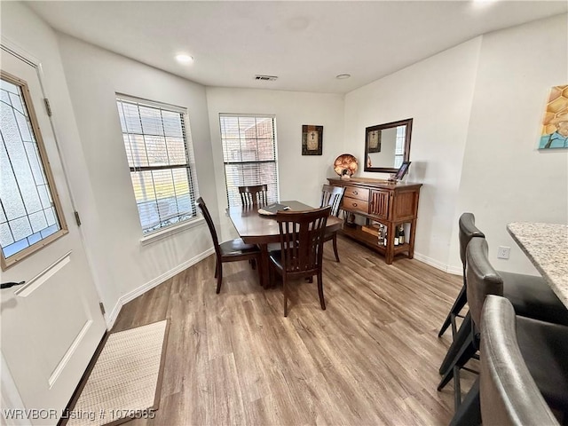 dining area featuring light hardwood / wood-style flooring