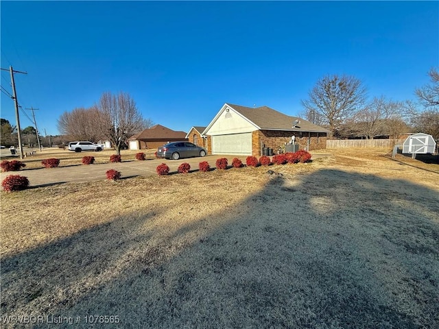 view of yard with a garage