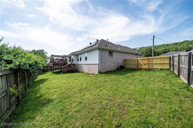 back of property featuring brick siding and stairway