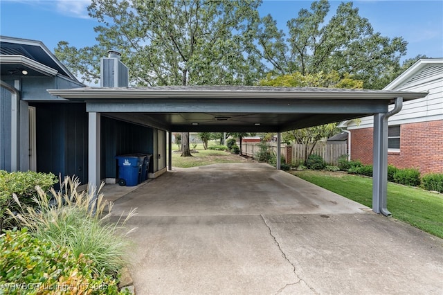 view of car parking featuring a yard and a carport