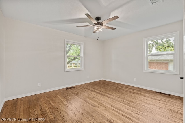 empty room featuring light hardwood / wood-style floors and ceiling fan