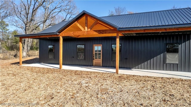 rear view of house featuring a patio