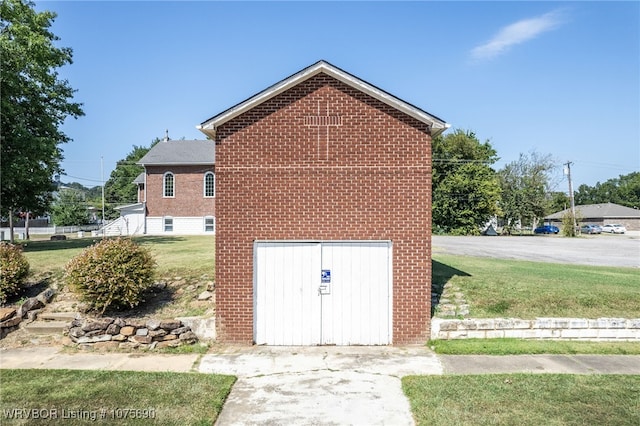 view of property exterior featuring a yard