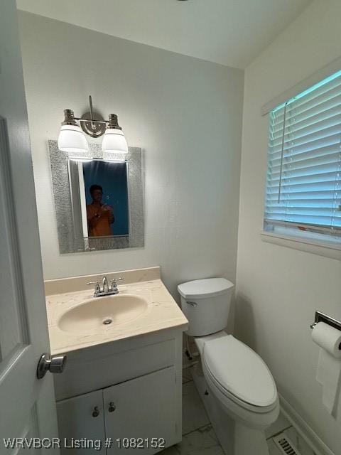 503 E Mayo Dr, Sallisaw, OK 74955 - half bath featuring vanity and marble look tile flooring
