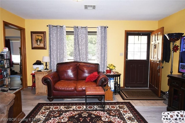 living room with light hardwood / wood-style floors