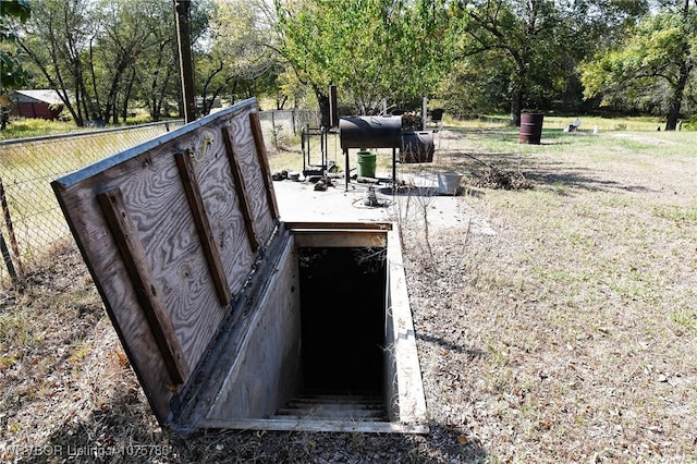 view of entry to storm shelter