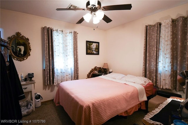 carpeted bedroom with ceiling fan