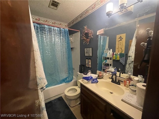 full bathroom featuring tile patterned flooring, a textured ceiling, toilet, shower / tub combo with curtain, and vanity