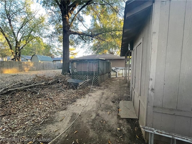 view of yard featuring a wooden deck