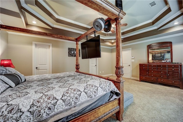 bedroom with visible vents, carpet, ornamental molding, recessed lighting, and a raised ceiling