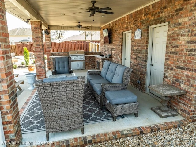 view of patio / terrace featuring a grill, an outdoor hangout area, fence, and ceiling fan