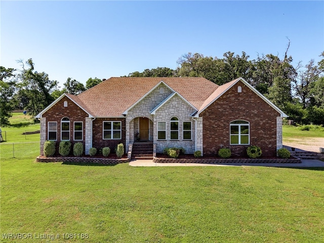 4758 Kibler Rd, Van Buren, AR 72956 - view of front of home featuring a front lawn, stone siding, brick siding, and a shingled roof