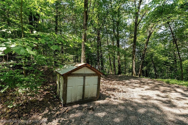 799 Sugar Maple Bnd, Rudy, AR 72952 - view of shed featuring a view of trees