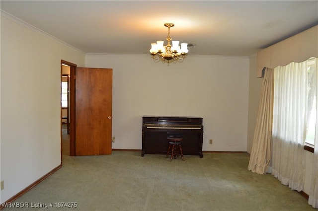 misc room with light colored carpet, crown molding, and a chandelier