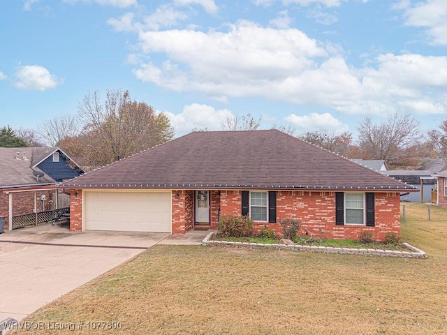 view of front of home featuring a garage and a front yard