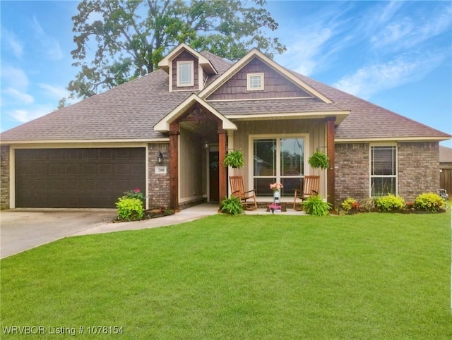 200 Honeysuckle St, Alma, AR 72921 - craftsman-style home featuring an attached garage, a front yard, a shingled roof, and driveway