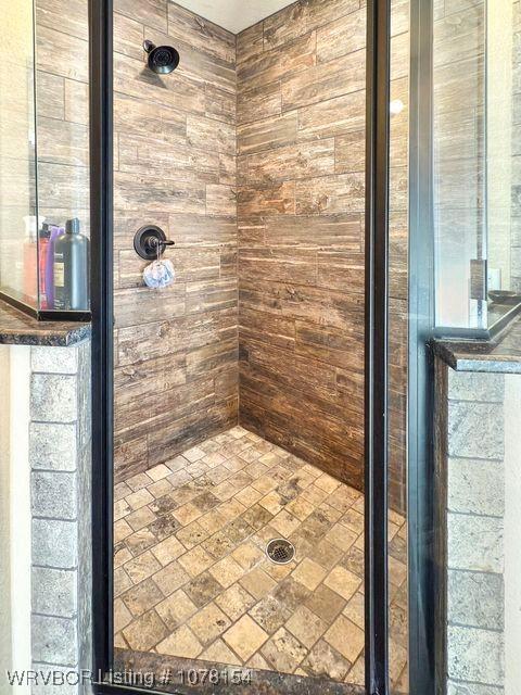 bathroom featuring a stall shower