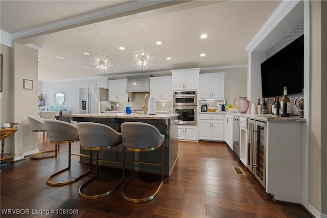 5701 Free Ferry Rd Unit 12, Fort Smith, AR 72903 - kitchen with stainless steel appliances, recessed lighting, ornamental molding, white cabinetry, and a chandelier