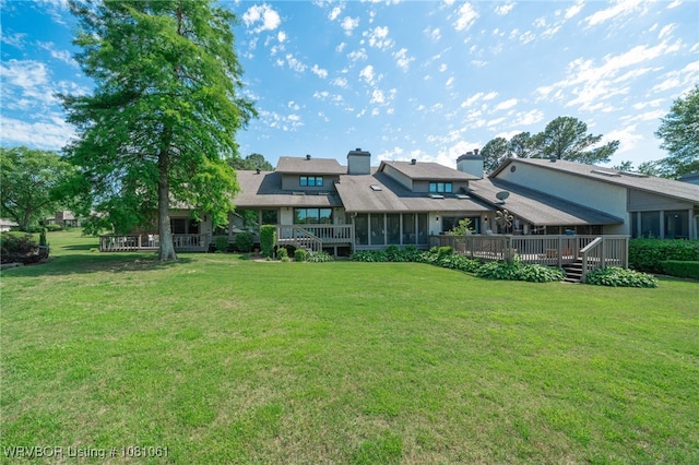 5701 Free Ferry Rd Unit 12, Fort Smith, AR 72903 - rear view of house with a sunroom, a yard, and a wooden deck