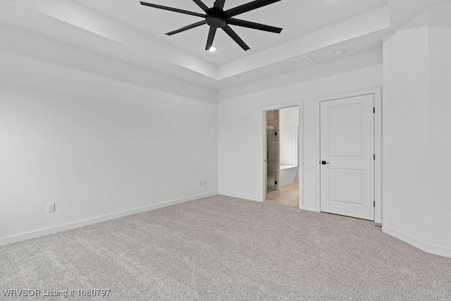 1317 Big Oak Dr, Alma, AR 72921 - empty room featuring a tray ceiling, baseboards, ceiling fan, light carpet, and recessed lighting