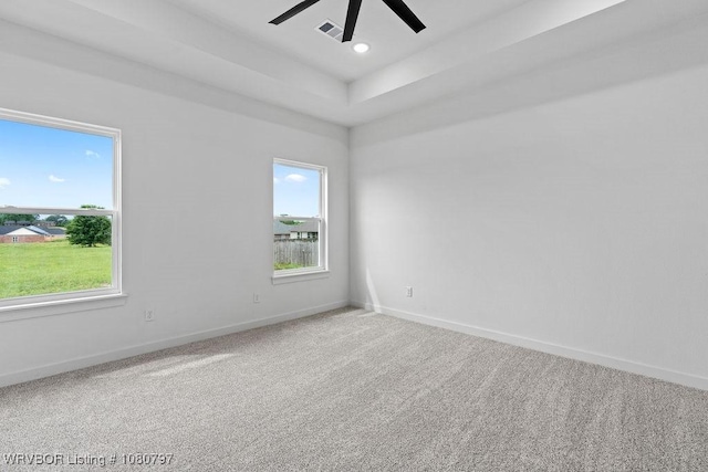 1317 Big Oak Dr, Alma, AR 72921 - carpeted empty room featuring visible vents, recessed lighting, ceiling fan, a raised ceiling, and baseboards