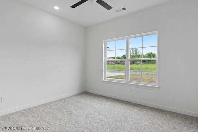 1317 Big Oak Dr, Alma, AR 72921 - spare room with visible vents, baseboards, a ceiling fan, and carpet floors