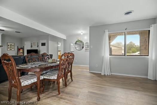 204 Cornell Ave, Fort Smith, AR 72908 - dining space featuring light wood finished floors and baseboards