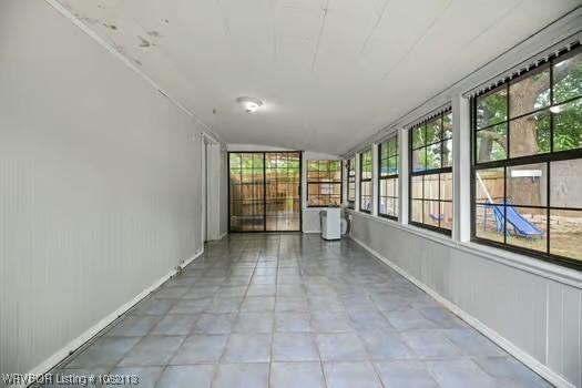 204 Cornell Ave, Fort Smith, AR 72908 - unfurnished sunroom featuring lofted ceiling and healthy amount of natural light