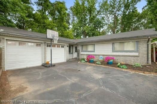 204 Cornell Ave, Fort Smith, AR 72908 - single story home featuring brick siding, driveway, and an attached garage