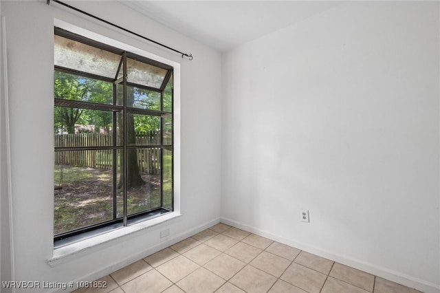 3232 Edinburgh Dr, Fort Smith, AR 72908 - spare room featuring healthy amount of natural light and light tile patterned floors