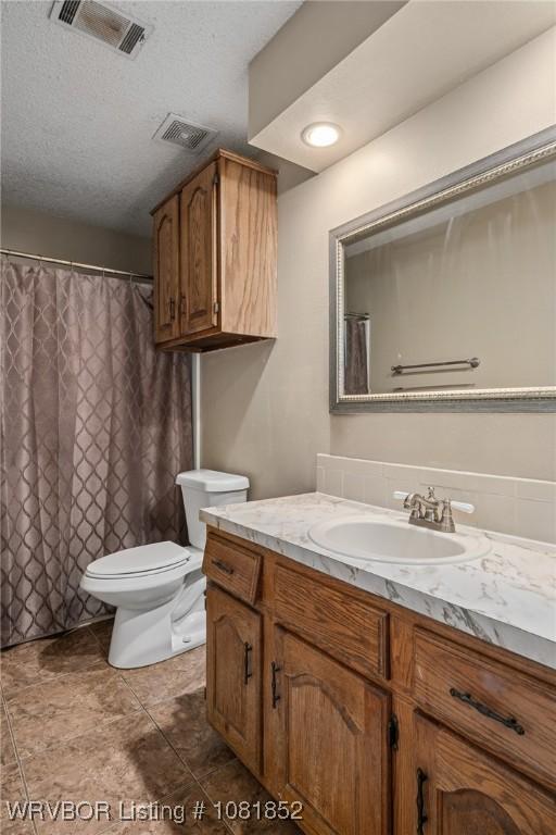 3232 Edinburgh Dr, Fort Smith, AR 72908 - full bath featuring vanity and a textured ceiling
