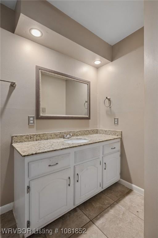 3232 Edinburgh Dr, Fort Smith, AR 72908 - bathroom featuring vanity, tile patterned flooring, and recessed lighting