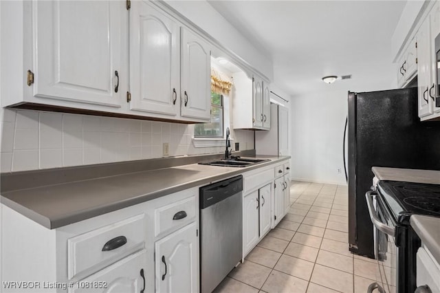 3232 Edinburgh Dr, Fort Smith, AR 72908 - kitchen with dishwasher, electric range, white cabinets, tasteful backsplash, and light tile patterned floors