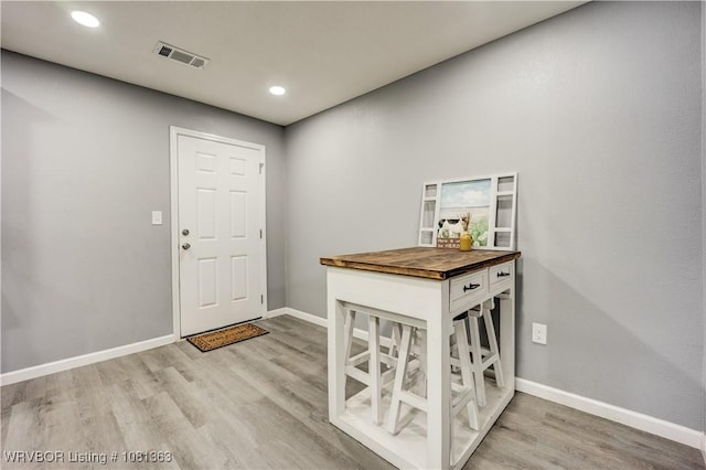 614 12th St, Van Buren, AR 72956 - entryway with light wood-type flooring, baseboards, and recessed lighting