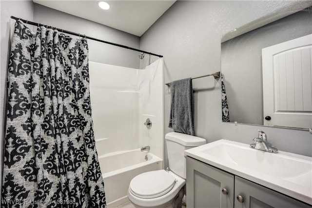 614 12th St, Van Buren, AR 72956 - full bathroom featuring vanity, toilet, and shower / bath combo with shower curtain