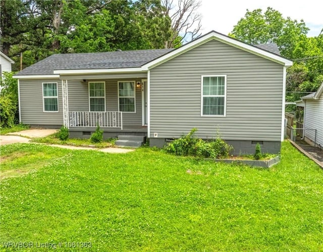 614 12th St, Van Buren, AR 72956 - view of front of house featuring crawl space, covered porch, roof with shingles, and a front yard