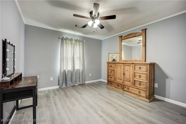 614 12th St, Van Buren, AR 72956 - bedroom featuring light wood-style floors, crown molding, baseboards, and ceiling fan