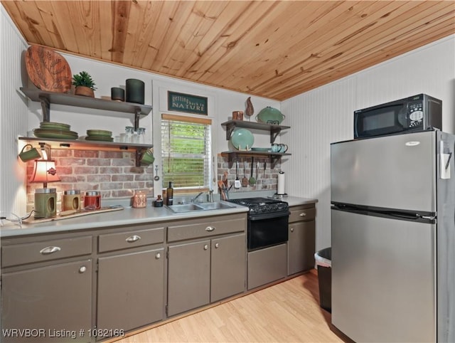33971 Holson Valley Rd, Wister, OK 74966 - kitchen with black appliances, open shelves, wooden ceiling, gray cabinetry, and light wood-style flooring