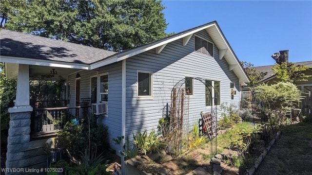 exterior space featuring cooling unit and covered porch