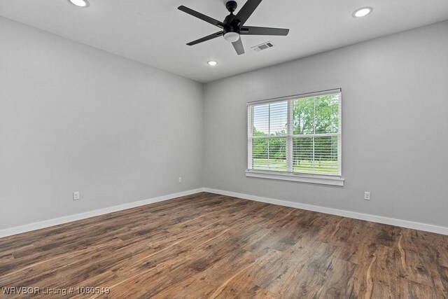 8208 Shaver Rd, Lavaca, AR 72941 - unfurnished room with baseboards, visible vents, wood finished floors, and recessed lighting