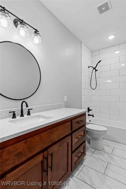 8208 Shaver Rd, Lavaca, AR 72941 - full bathroom with marble finish floor, toilet, vanity, visible vents, and washtub / shower combination